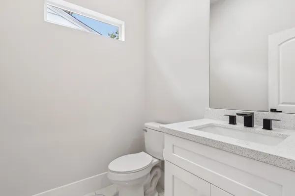 a bathroom with a sink and a toilet