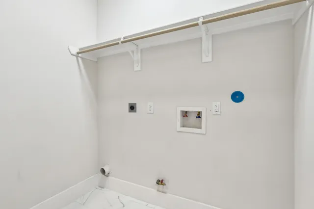 a view of backyard with wooden fence