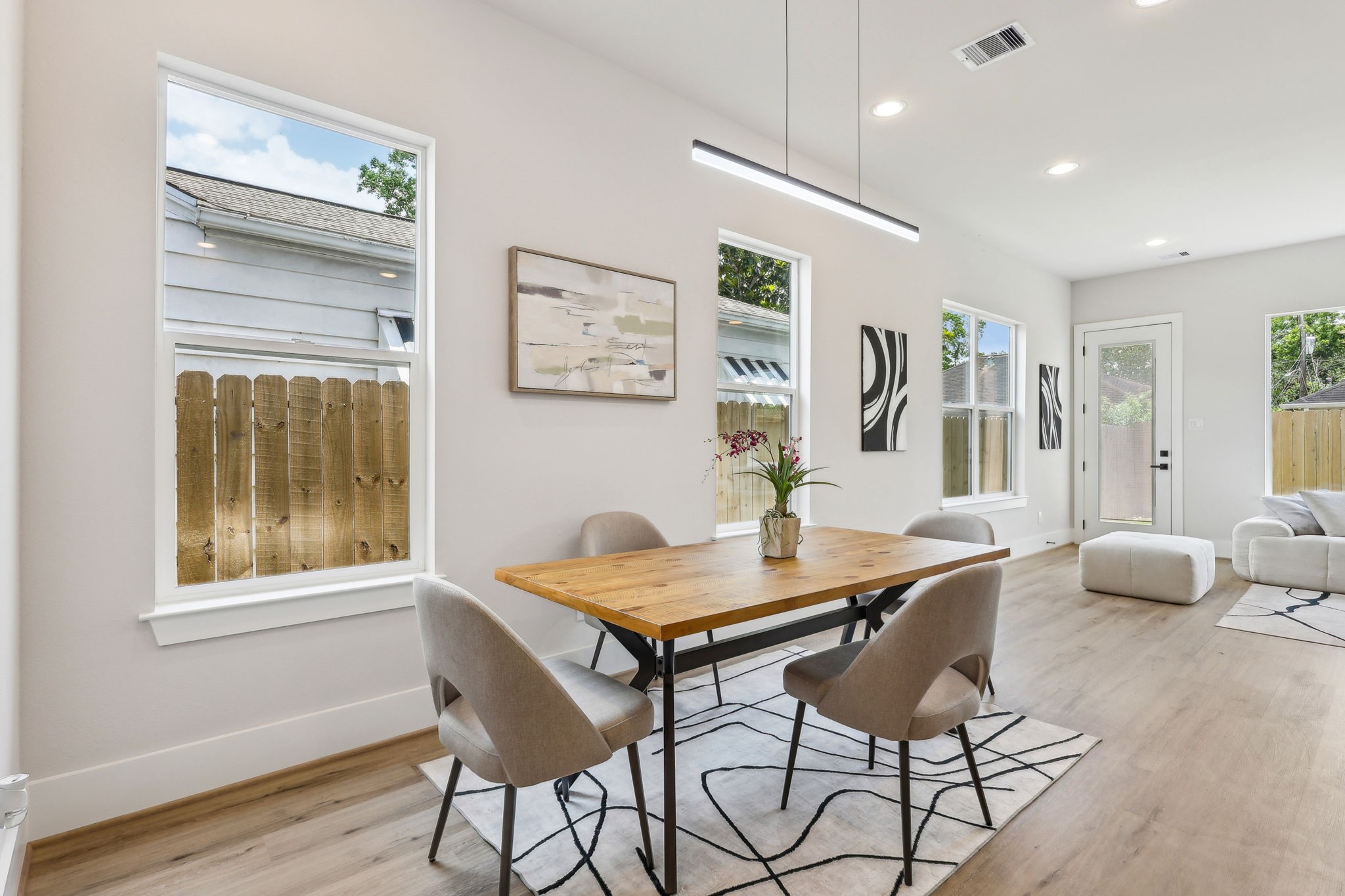 3722 Nathaniel Brown Street Houston, TX 77021 - Photo 6 of 30 a view of a dining room with furniture and wooden floor