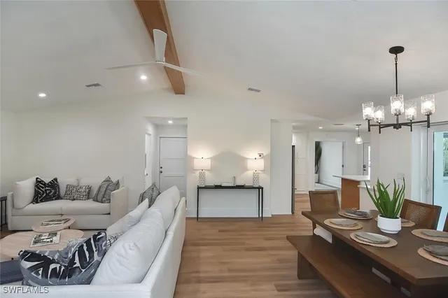 a large spacious bathroom with a large tub and shower