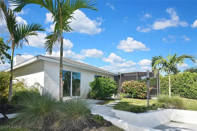a view of an empty room with a large window