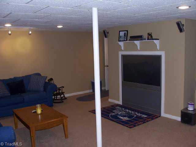 1136 Ridgecliff Drive Rural Hall, NC 27045 - Photo 5 of 9 Other. Den in Basement with Built-in Space for Big Screen TV