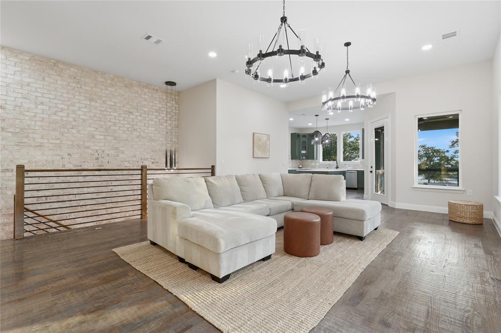 2150 Lakeview Mabank, TX 75156 - Photo 12 of 36 a living room with furniture chandelier and a table