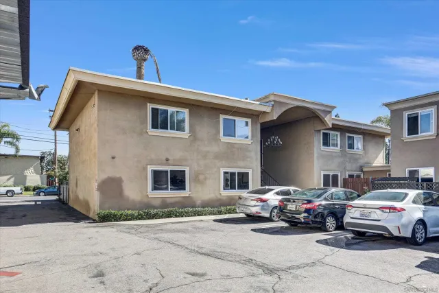 a car parked in front of a house
