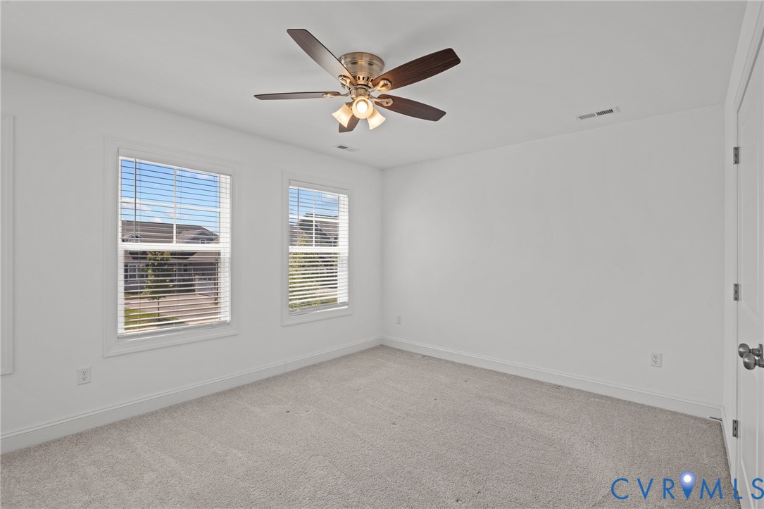 224 Lauradell Road Ashland, VA 23005 - Photo 45 of 74 Carpeted room featuring two windows with horizonta