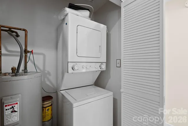 a view of a balcony with a table and chairs