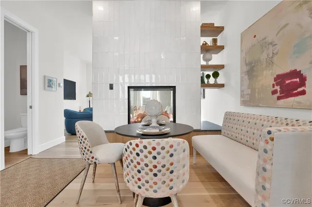 a living room with furniture and a table