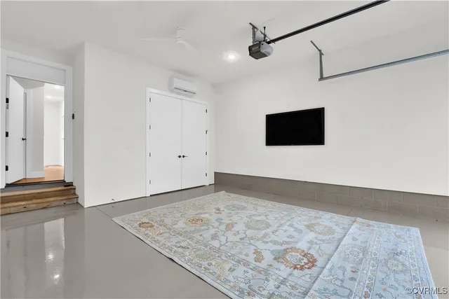 a view of a livingroom with wooden floor