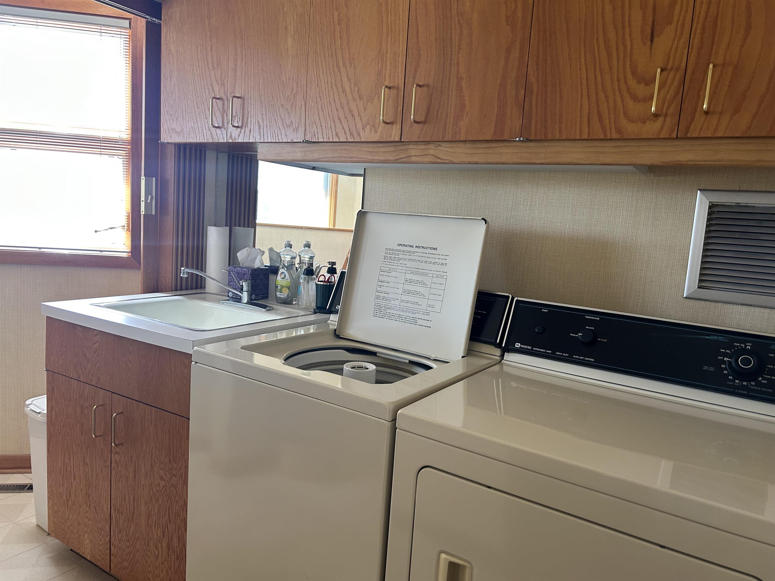 18573 Caledonia Road Caledonia, IL 61011 - Photo 18 of 36 a kitchen with granite countertop a sink stove and cabinets