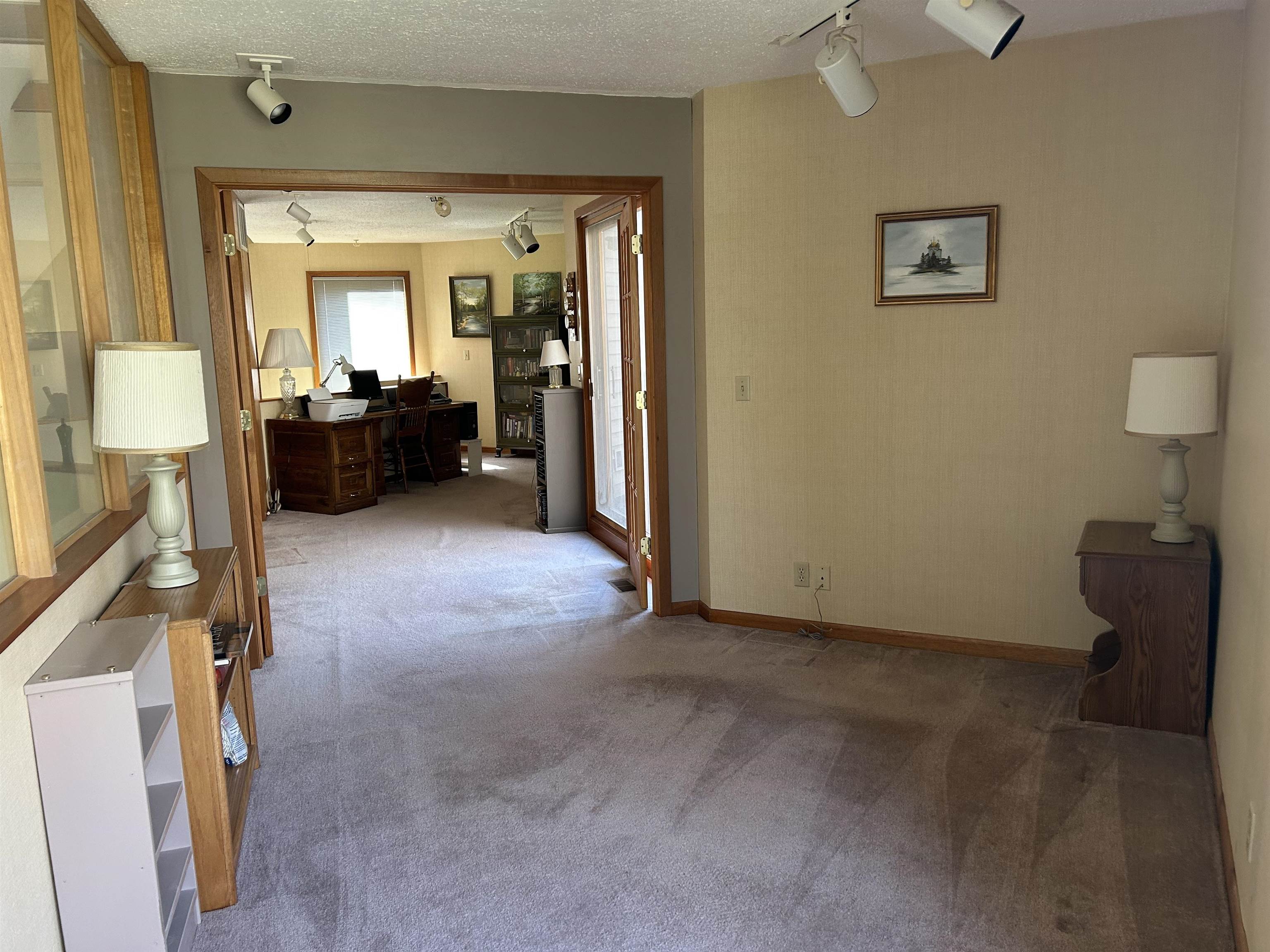 18573 Caledonia Road Caledonia, IL 61011 - Photo 20 of 36 a view of a livingroom with workspace and a couch