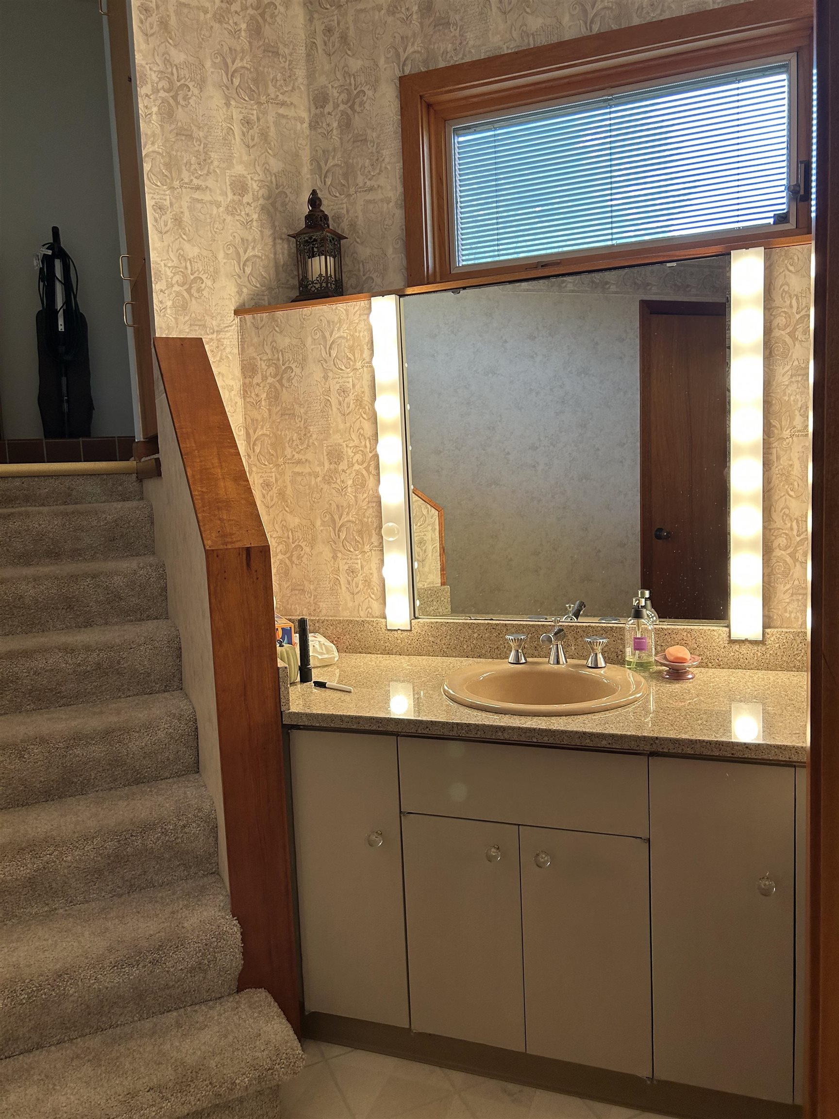 18573 Caledonia Road Caledonia, IL 61011 - Photo 26 of 36 a bathroom with a sink and a mirror