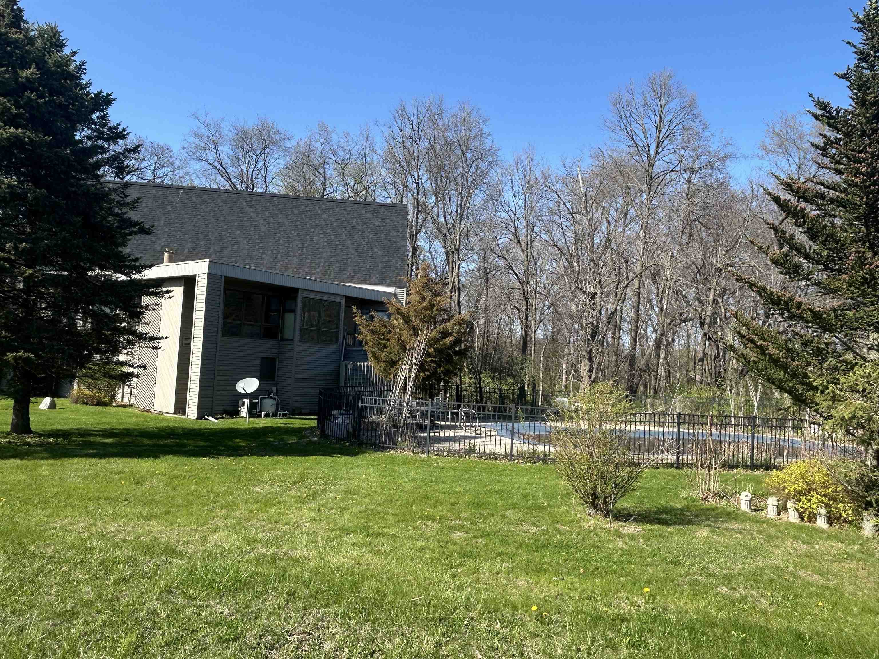 18573 Caledonia Road Caledonia, IL 61011 - Photo 31 of 36 a view of a house with a yard and tree s