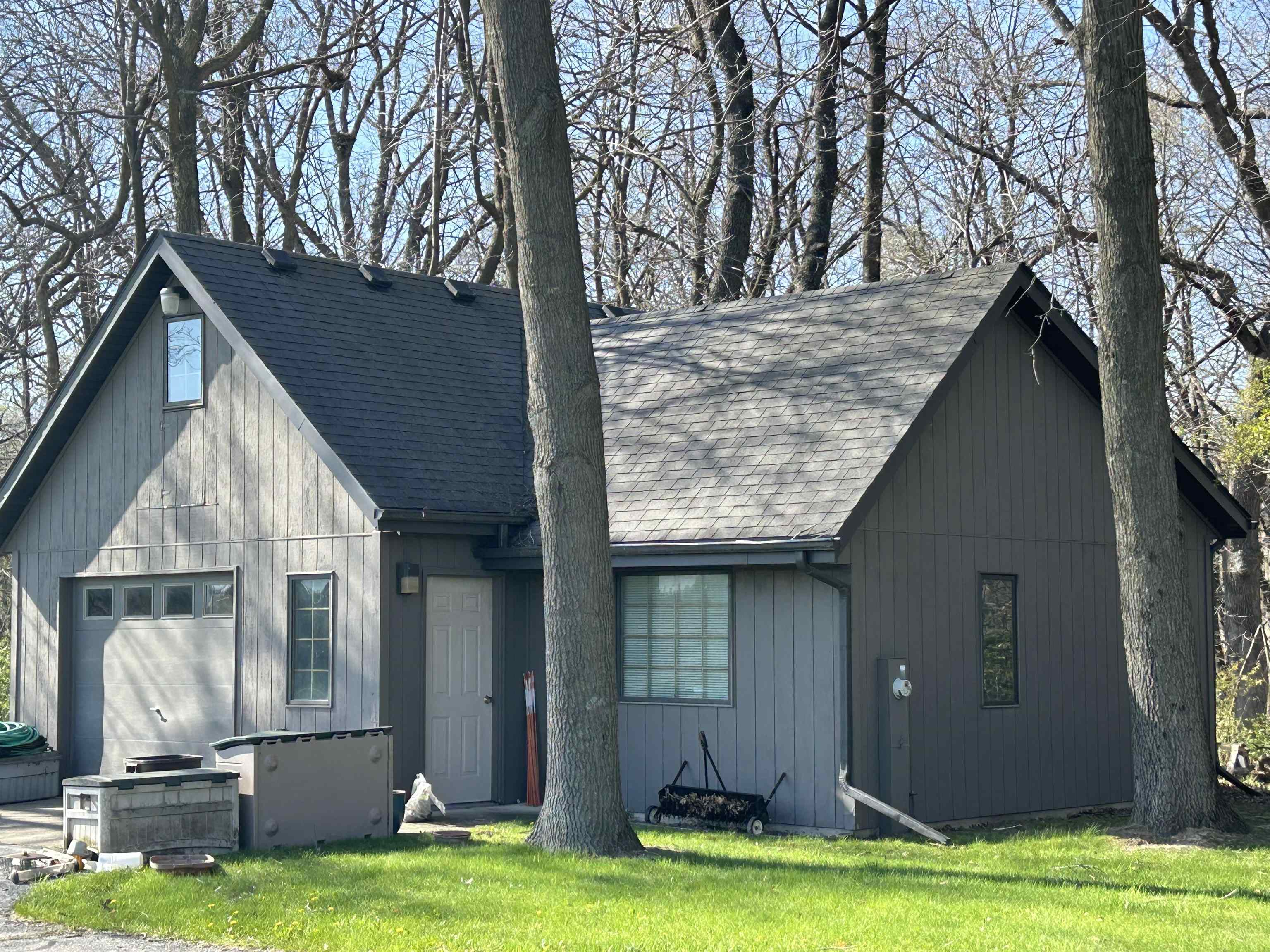 18573 Caledonia Road Caledonia, IL 61011 - Photo 32 of 36 a view of a swimming pool with lawn chairs under an umbrella