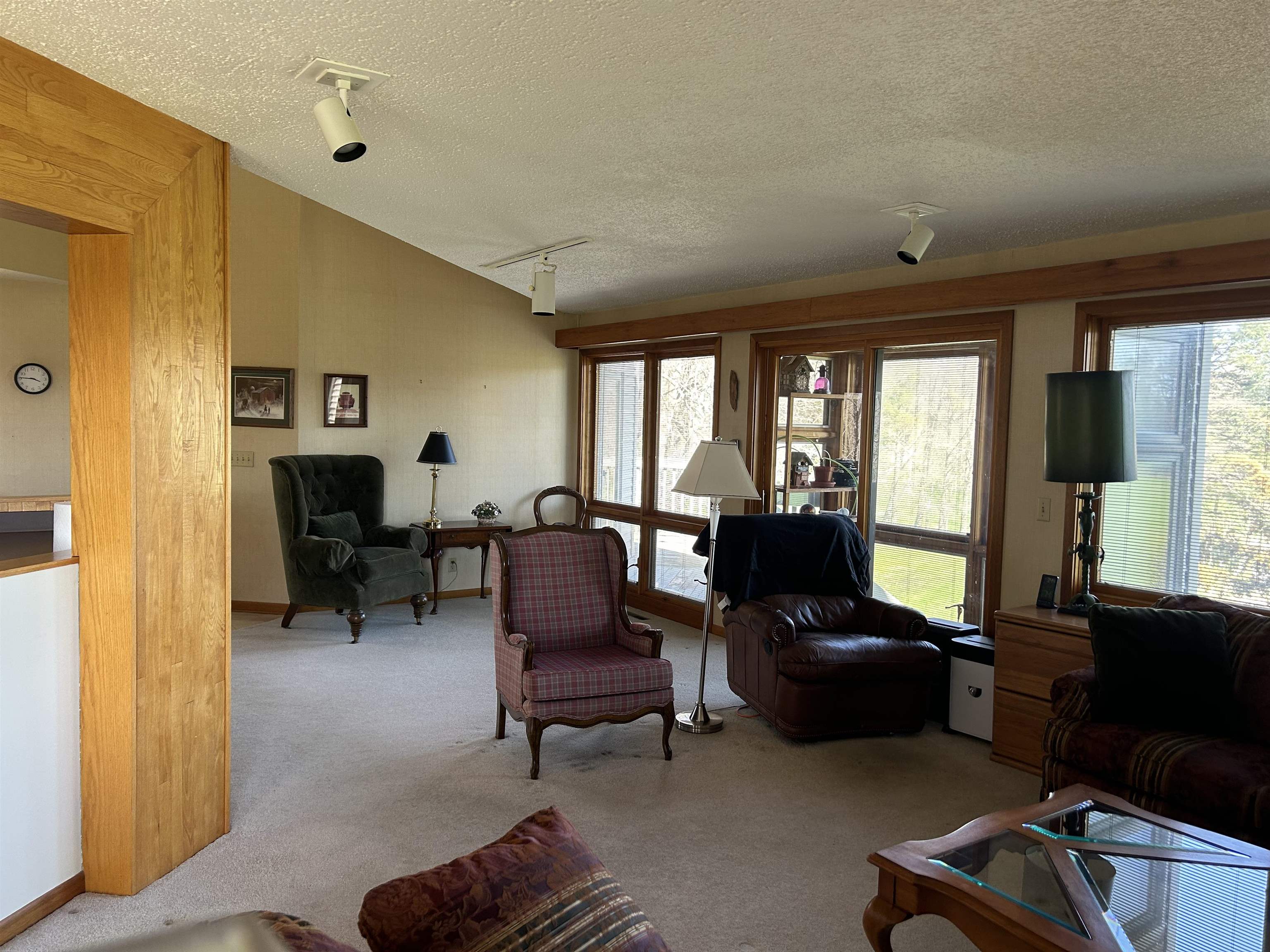 18573 Caledonia Road Caledonia, IL 61011 - Photo 6 of 36 a living room with furniture and a fireplace