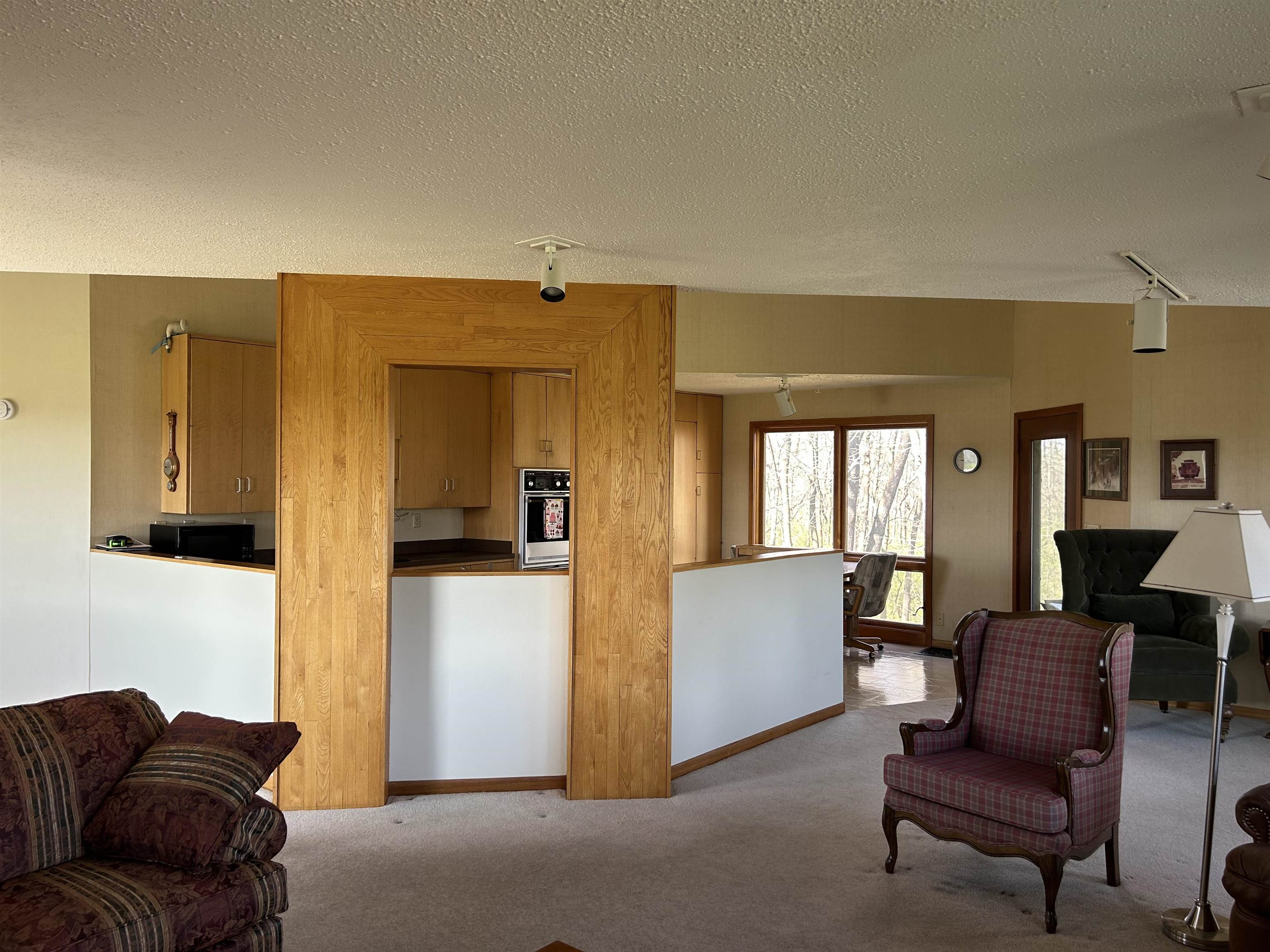 18573 Caledonia Road Caledonia, IL 61011 - Photo 7 of 36 a living room with furniture and a window