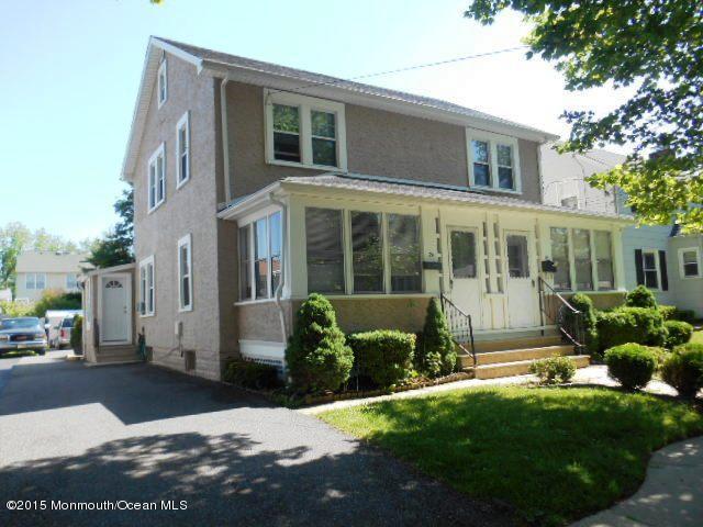 7-a-b Ellis Street Freehold, NJ 07728 - Photo 1 of 23 a front view of a house with a yard