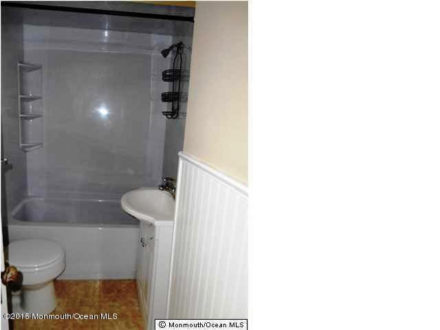 7-a-b Ellis Street Freehold, NJ 07728 - Photo 14 of 23 a bathroom with a toilet and a shower