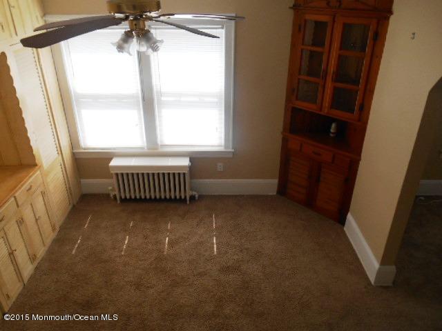 7-a-b Ellis Street Freehold, NJ 07728 - Photo 3 of 23 a view of an empty room with a window