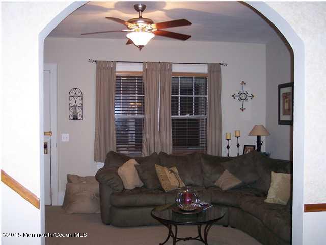 7-a-b Ellis Street Freehold, NJ 07728 - Photo 6 of 23 a living room with furniture and a large window