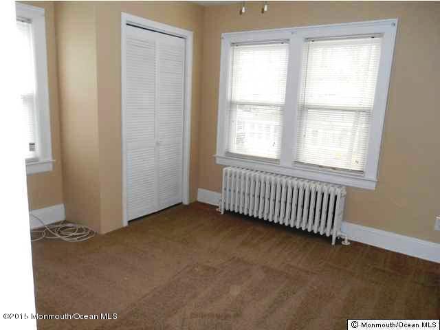 7-a-b Ellis Street Freehold, NJ 07728 - Photo 7 of 23 a view of a livingroom with a window