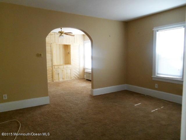 7-a-b Ellis Street Freehold, NJ 07728 - Photo 8 of 23 an empty room with windows