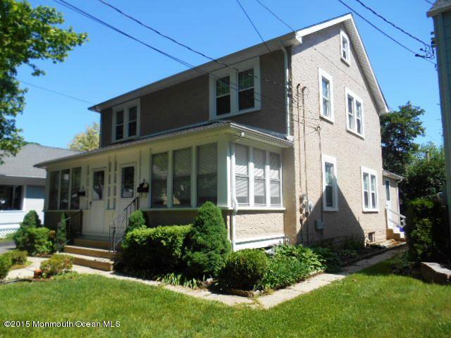 7-a-b Ellis Street Freehold, NJ 07728 - Photo 10 of 23 a front view of a house with a yard