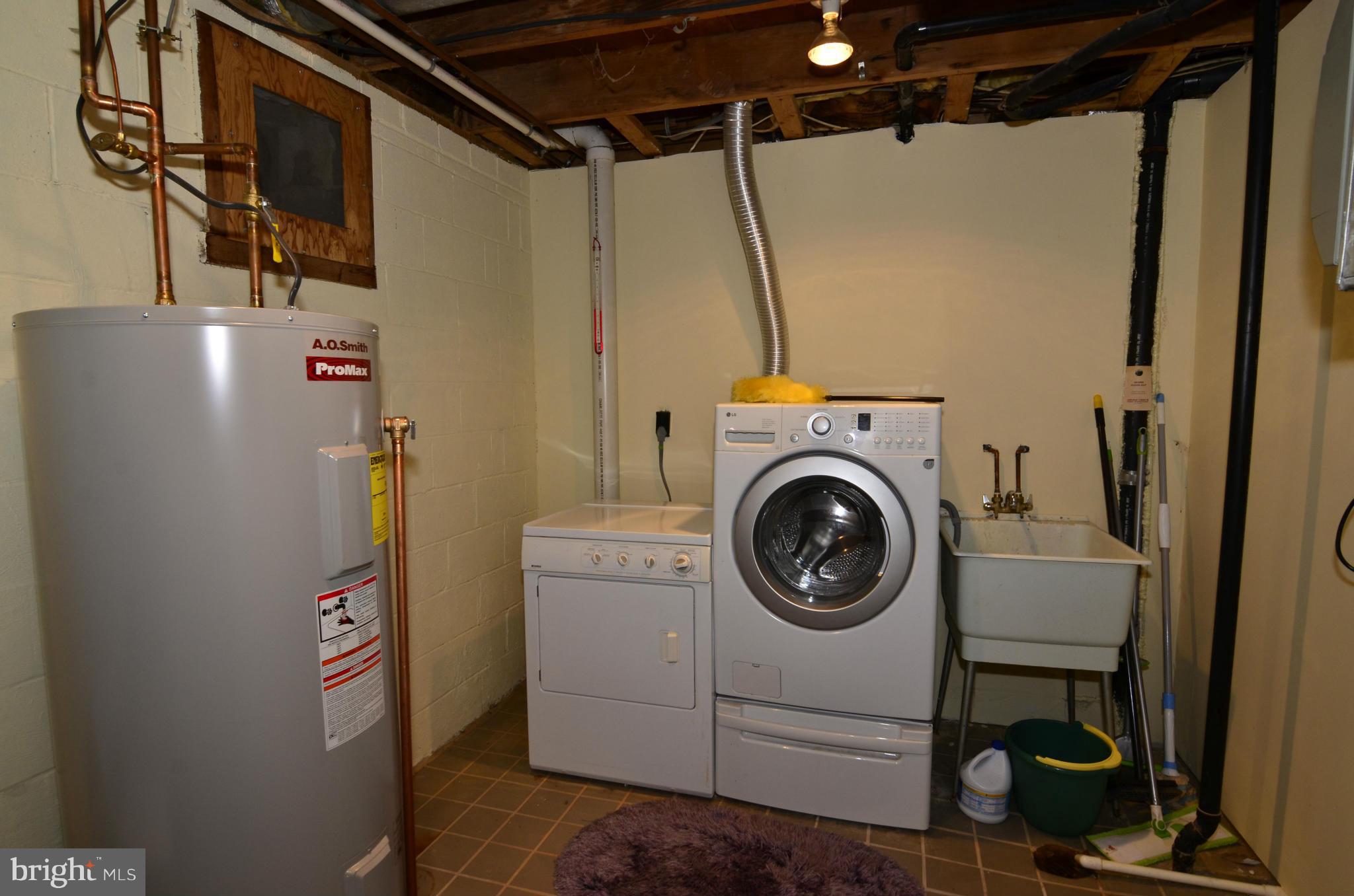 2161 Cabots Point Lane Reston, VA 20191 - Photo 22 of 26 a utility room with dryer and washer