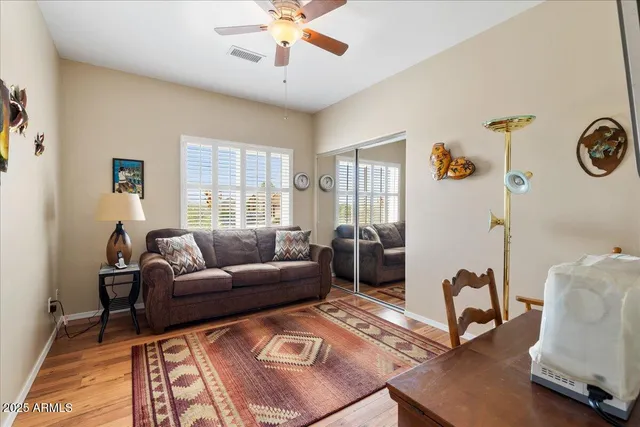 a living room with furniture and a window