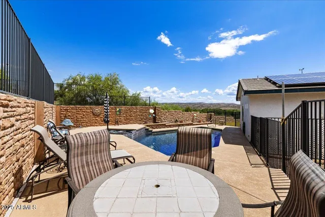 a view of a patio with couches table and chairs