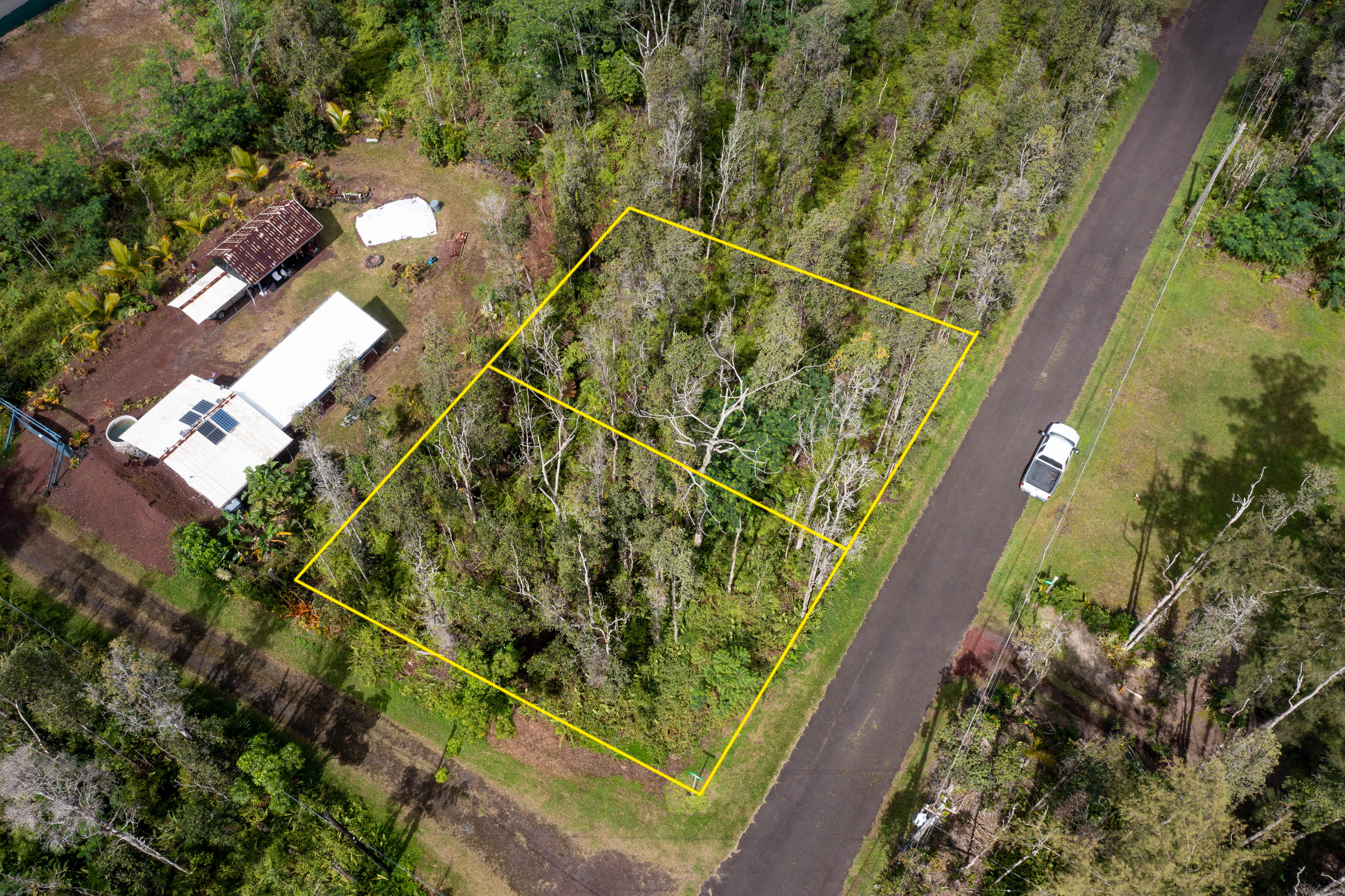 44 Seaview Road Pahoa, HI 96778 - Photo 21 of 22 a view of a yard with plants
