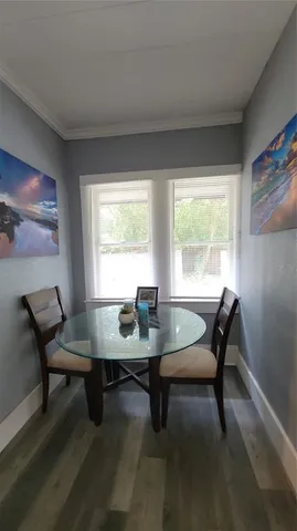 a bedroom with a bed and a chair