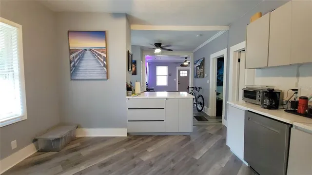 a room with window and mirror