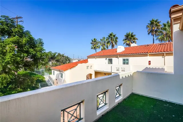 an outdoor view of house with swimming pool
