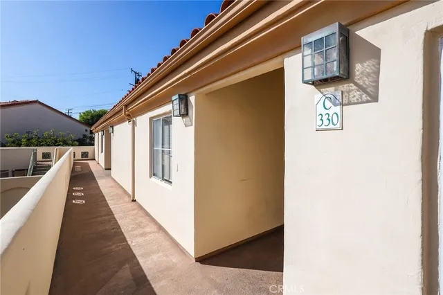 a view of balcony with furniture