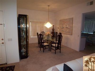 27 Oak Tree Drive Rancho Mirage, CA 92270 - Photo 4 of 21 a view of a dining room with furniture