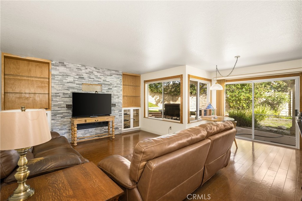 3250 North Geronimo Avenue Simi Valley, CA 93063 - Photo 17 of 47 a living room with furniture and a flat screen tv
