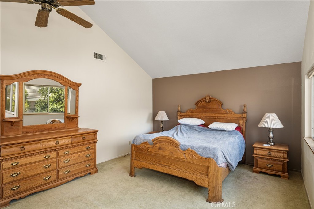 3250 North Geronimo Avenue Simi Valley, CA 93063 - Photo 37 of 47 a bedroom with a bed and a dresser in it