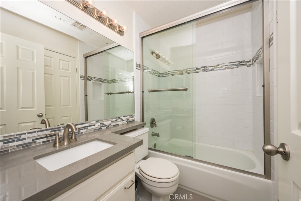 3250 North Geronimo Avenue Simi Valley, CA 93063 - Photo 45 of 47 a bathroom with a sink a toilet and shower