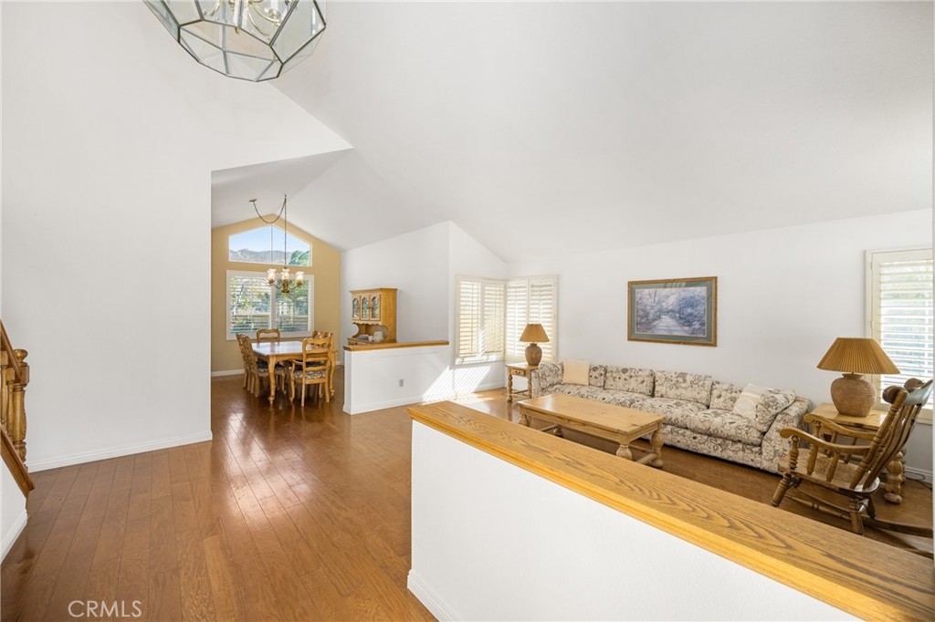 3250 North Geronimo Avenue Simi Valley, CA 93063 - Photo 8 of 47 a living room with furniture and next to a window with garden view