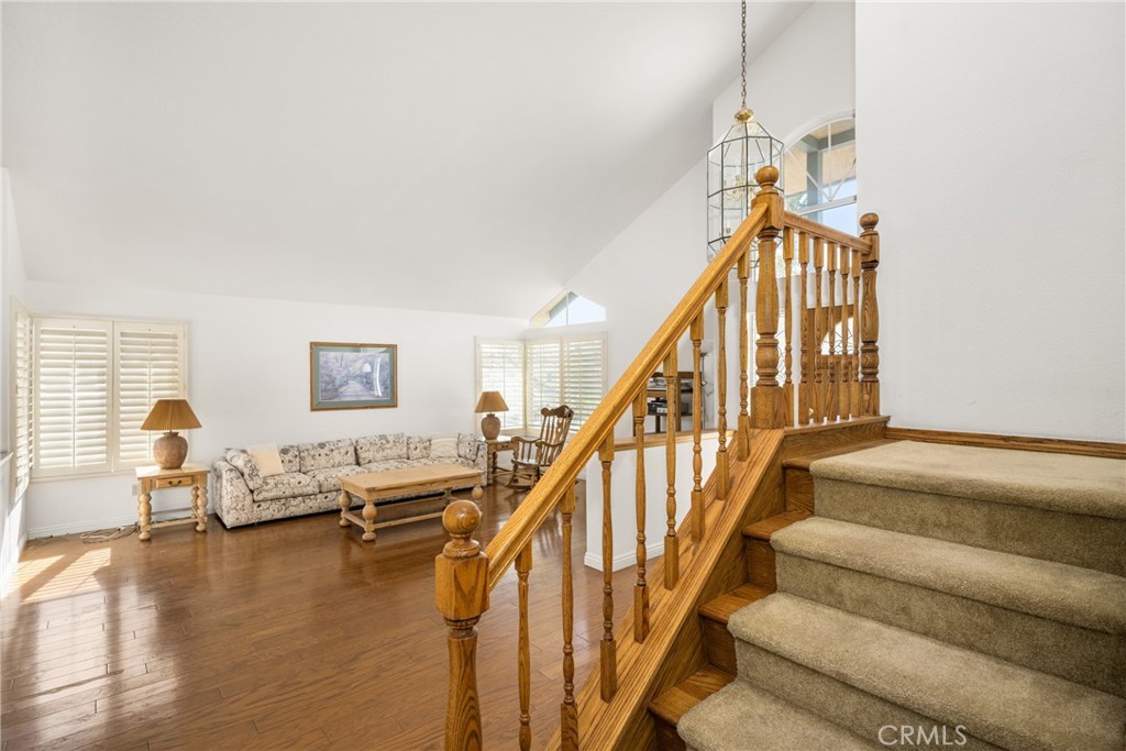 3250 North Geronimo Avenue Simi Valley, CA 93063 - Photo 10 of 47 a living room with furniture and stairs