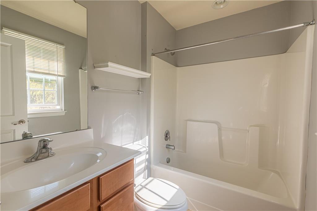 240 Broadstone Drive Mars, PA 16046 - Photo 13 of 23 a bathroom with a sink a toilet and shower
