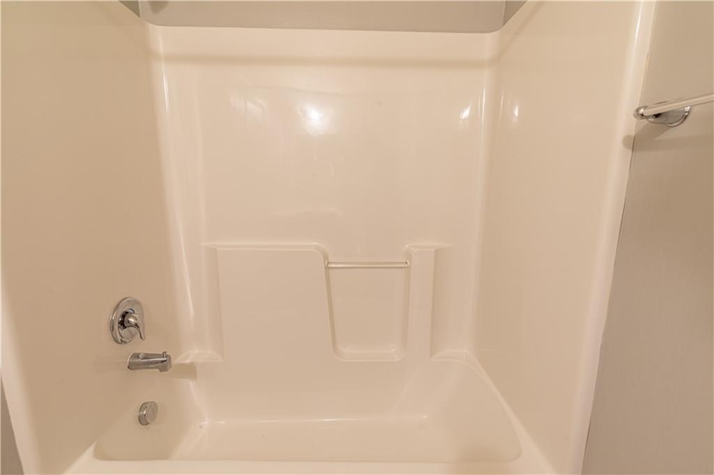 240 Broadstone Drive Mars, PA 16046 - Photo 17 of 23 a bathroom with a bathtub