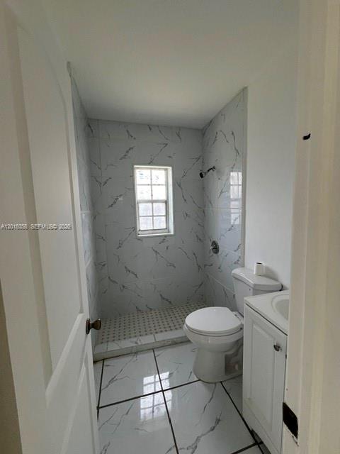 441 Southwest 10th Street, Unit 4 Miami, FL 33130 - Photo 14 of 18 a bathroom with a toilet and a shower
