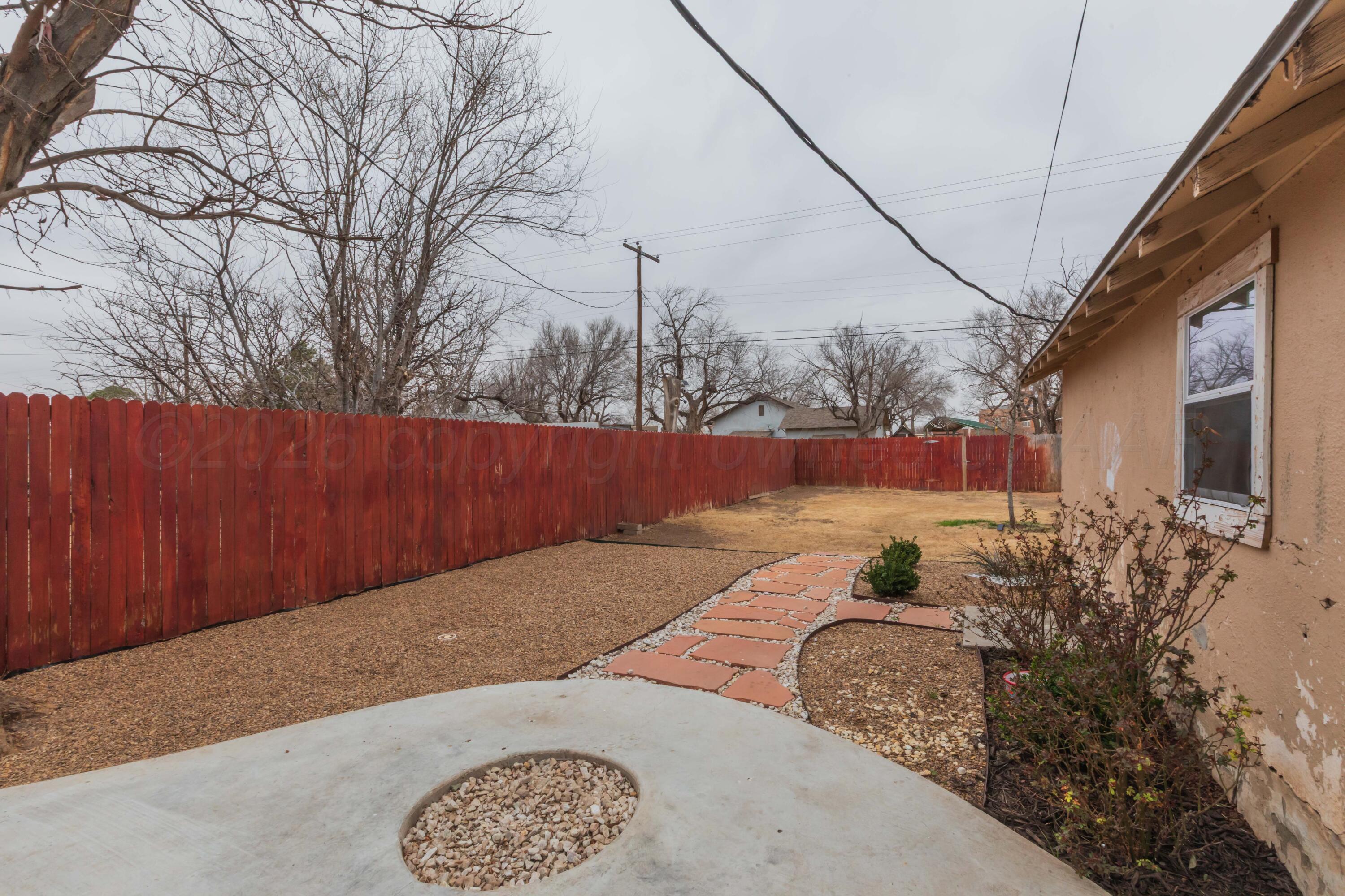 1503 7th Avenue Canyon, TX 79015 - Photo 29 of 30 a view of backyard with seating space