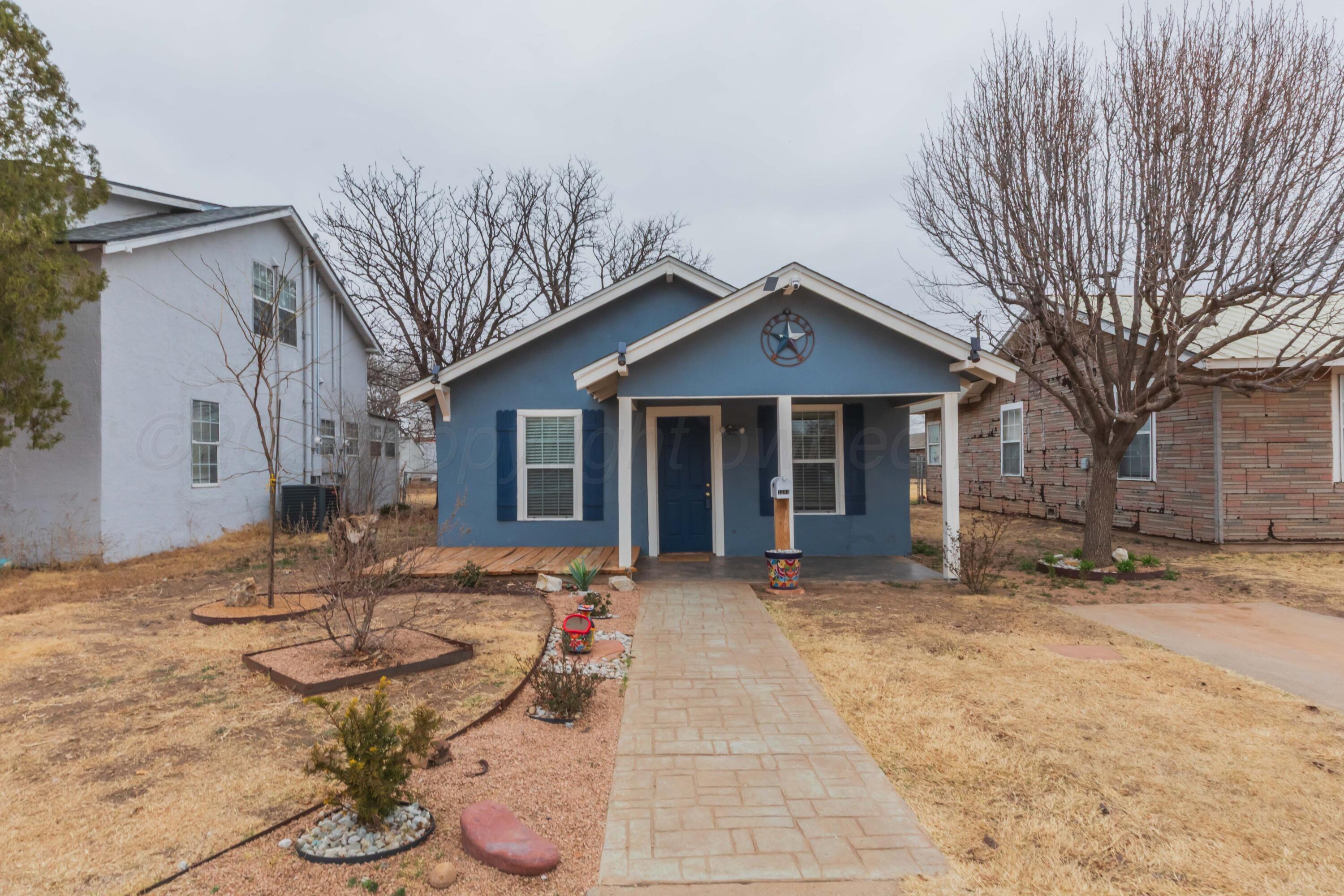 1503 7th Avenue Canyon, TX 79015 - Photo 30 of 30 a backyard of a house with table and chairs