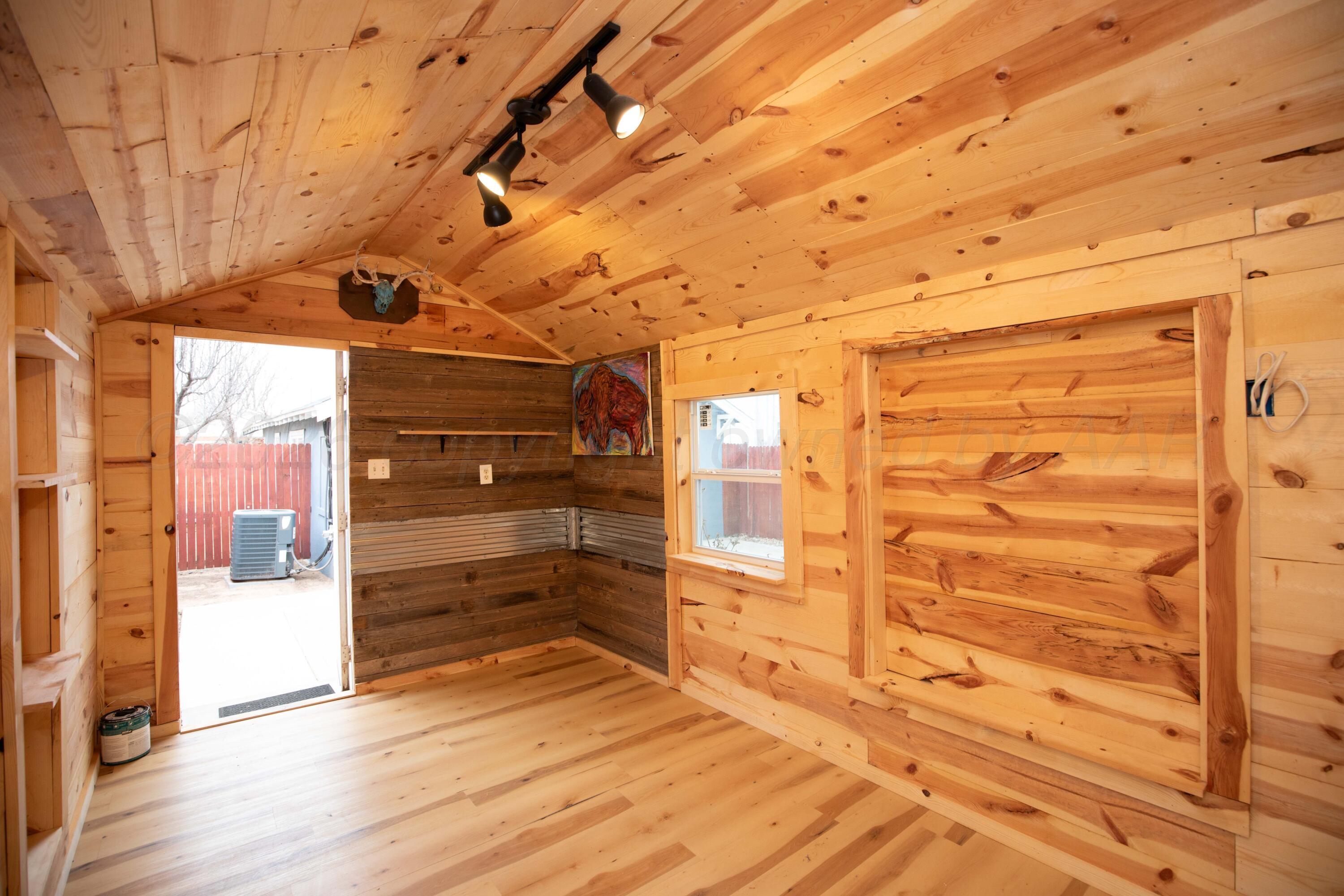 1503 7th Avenue Canyon, TX 79015 - Photo 8 of 30 a view of a walk in closet