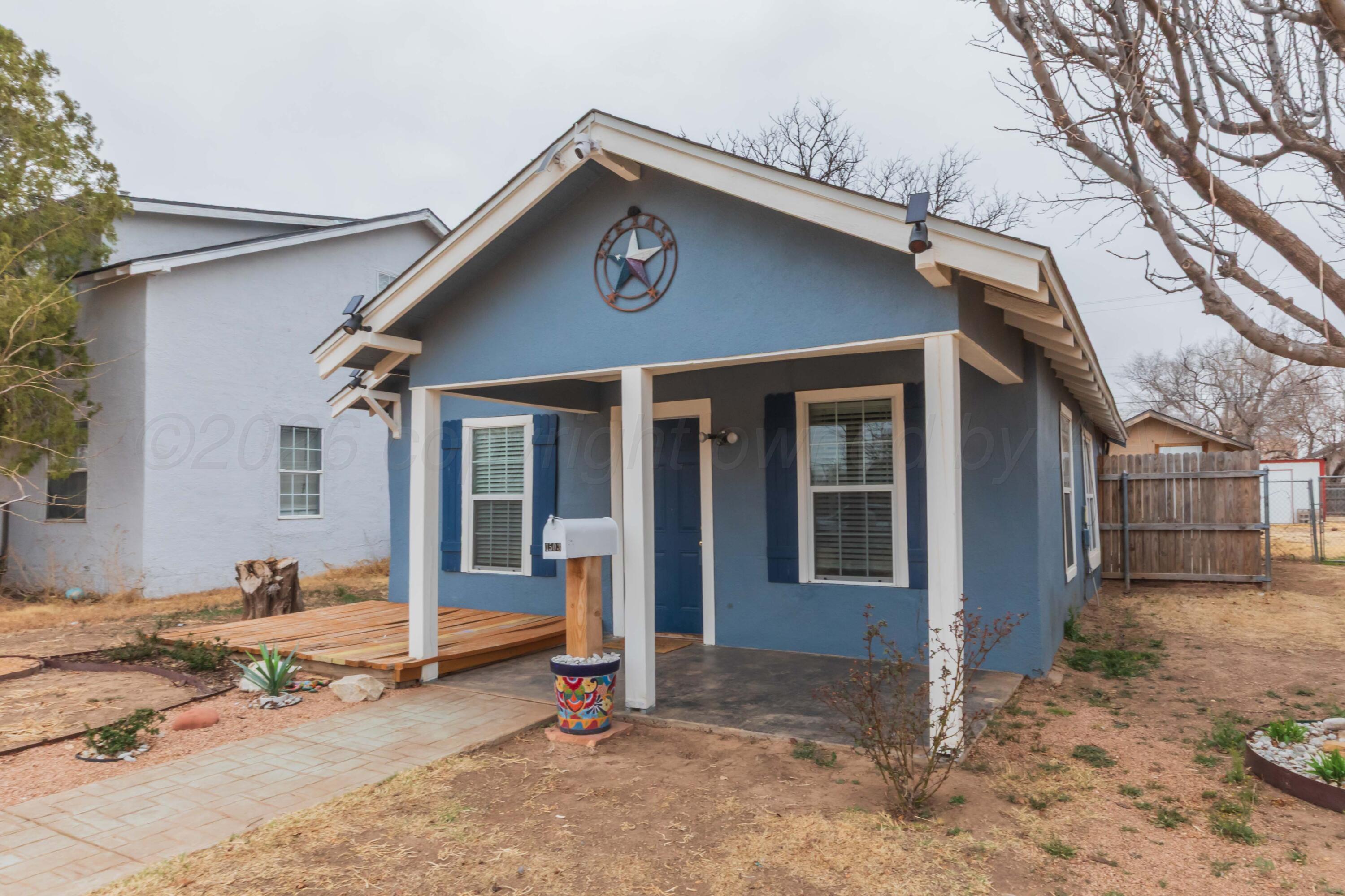 1503 7th Avenue Canyon, TX 79015 - Photo 10 of 30 a front view of a house with a yard