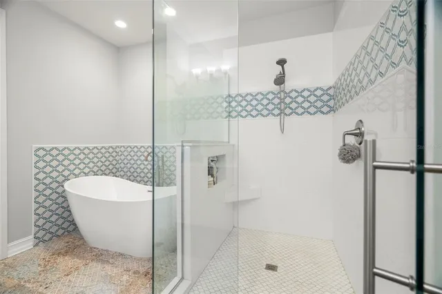 a bathroom with a toilet and shower