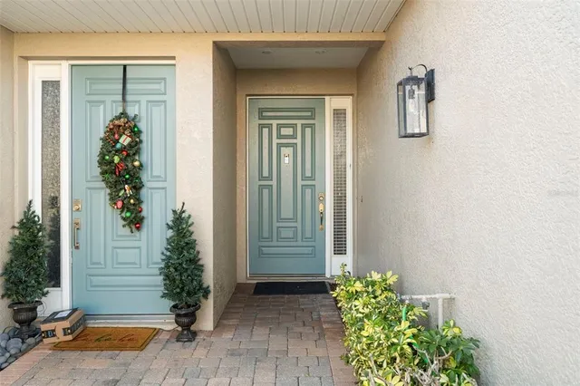 a potted plant in front of a house