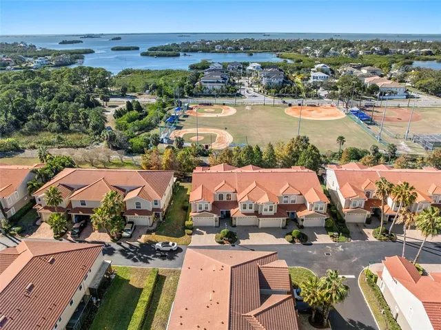 an aerial view of a swimming pool with outdoor space